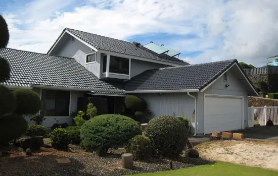 Home With Coated Tile Roof